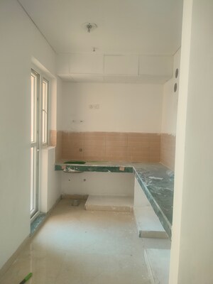 Kitchen in 2 BHK Apartment at Adore Happy Homes Grand, Sector 85 – for Sale