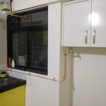 Kitchen in 2 BHK Apartment at Sadguru Garden CHS, Ghodbunder Road – for Rent