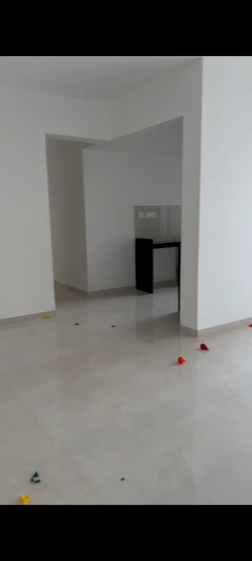 Living Room in 2 BHK Apartment at Godrej Vihaa, Badlapur East – for Rent