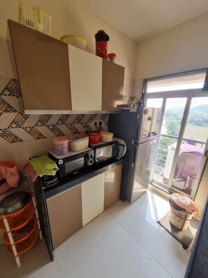 Kitchen in 2 BHK Apartment at JVM Sky Court, Bhayandarpada – for Sale