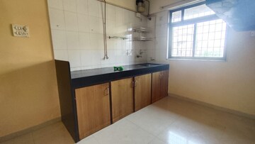 Kitchen in 1 BHK Apartment at Acme Apna Ghar, Goregaon East – for Rent