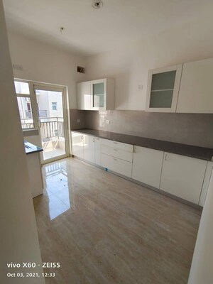 Kitchen in 3.5 BHK Apartment at Puri Aman Vilas, Sector 89 – for Sale