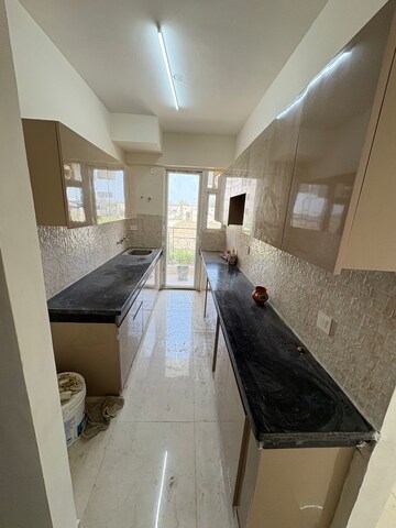 Kitchen in 2 BHK Apartment at Signature The Millennia 2, Sector 37d – for Rent