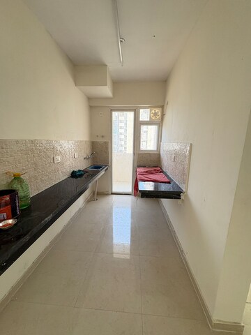 Kitchen in 2 BHK Apartment at Signature The Millennia 2, Sector 37d – for Rent