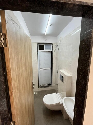 Bathroom in 1 BHK Apartment at Newlook Bhavya Elite, Wadala – for Sale