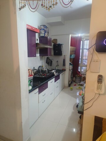 Kitchen in 2 BHK Apartment at Puranik Rumah Bali, Ghodbunder Road – for Rent