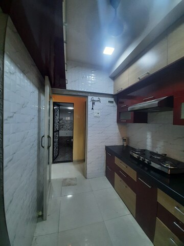 Kitchen in 1 BHK Apartment at Galaxy Classique, Goregaon West – for Rent