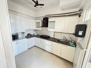 Kitchen in 3 BHK Apartment at Vasu Fortune Residency, Raj Nagar Extension – for Sale