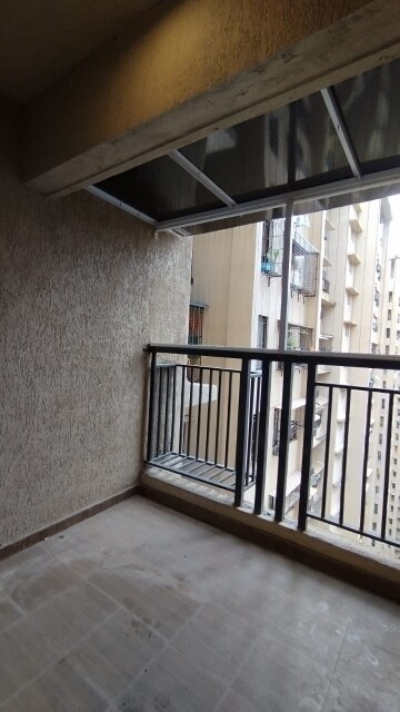Balcony in 2 BHK Apartment at Raunak City Sector 4 D8, Kalyan West – for Rent