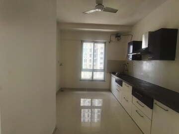 Kitchen in 1 BHK Apartment at Puranik Rumah Bali, Ghodbunder Road – for Rent