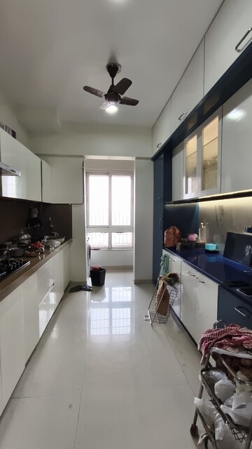 Kitchen in 2 BHK Apartment at Puranik Rumah Bali, Ghodbunder Road – for Rent