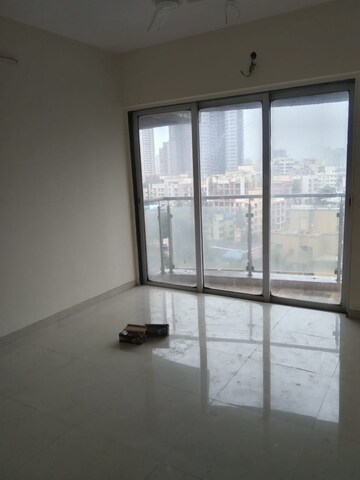 Room in 2 BHK Apartment at Lotus Link Square, Malad West – for Rent