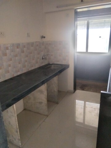Kitchen in 2 BHK Apartment at Lotus Link Square, Malad West – for Rent