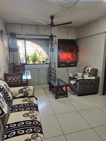Living Room in 1 BHK Apartment at Raunak Bliss, Ghodbunder Road – for Rent