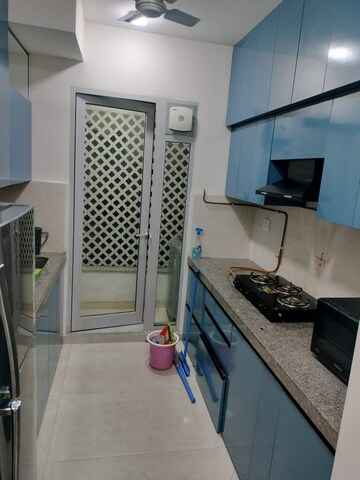 Kitchen in 2 BHK Apartment at Piramal Vaikunth, Balkum Pada – for Rent