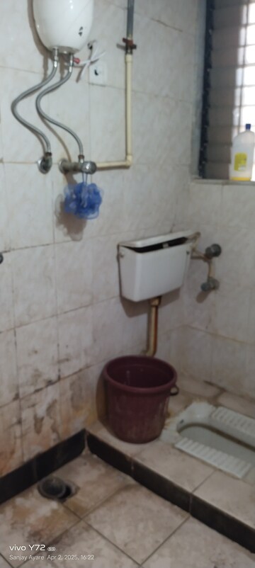 Bathroom in 1 BHK Apartment at AMI Jharna, Goregaon East – for Rent