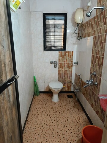 Bathroom in 2 BHK Apartment at AMI Jharna, Goregaon East – for Rent