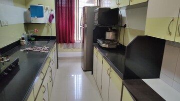 Kitchen in 2 BHK Apartment at Aruna Residency, Malad West – for Rent