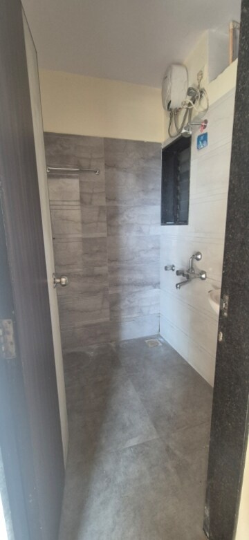 Bathroom in 1 BHK Apartment at Kaydee Solitaire, Malad East – for Sale