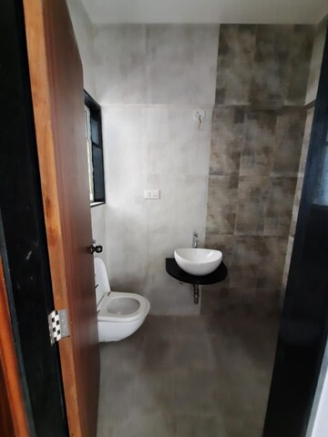 Bathroom in 3 BHK Apartment at Bella Arwana, Karve Nagar – for Sale