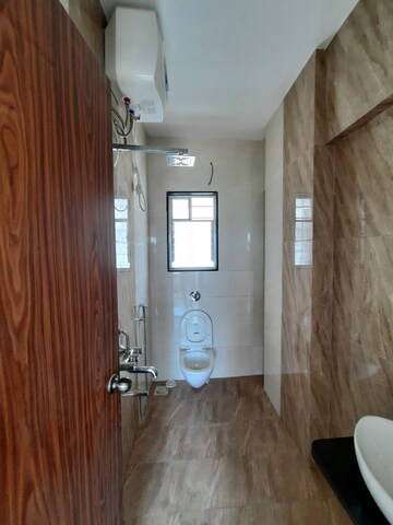 Bathroom in 3 BHK Apartment at Bella Arwana, Karve Nagar – for Sale