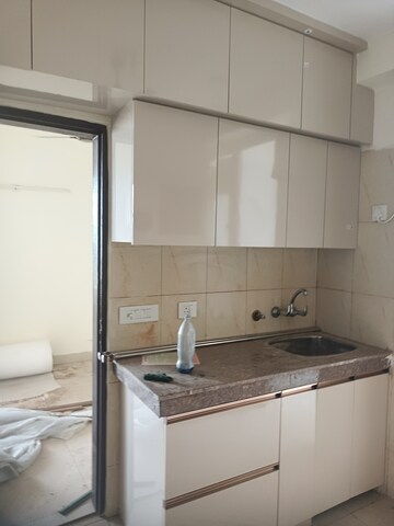 Kitchen in 3 BHK Apartment at 3C Lotus Panache, Sector 110 – for Rent