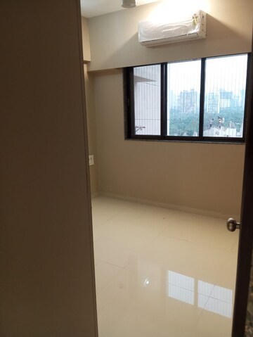 Master Bedroom in 2 BHK Apartment at Lotus Unity, Versova – for Rent