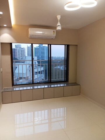 Living Room in 2 BHK Apartment at Lotus Unity, Versova – for Rent