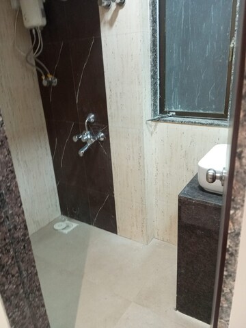 Bathroom in 2 BHK Apartment at Lotus Unity, Versova – for Rent
