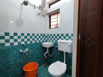 Bathroom in 2 BHK Apartment at Mahadevpura – for Rent