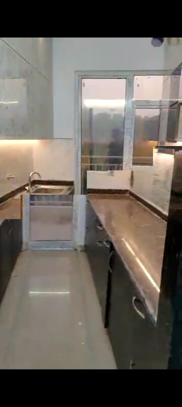 Kitchen in 3.5 BHK Apartment at Patel Neotown, Tech Zone 4 Greater Noida – for Rent