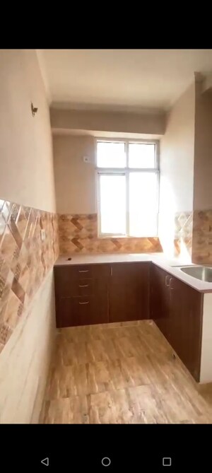 Kitchen in 2.5 BHK Apartment at Amrapali Golf Homes, Sector 4 Greater Noida – for Sale