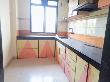 Kitchen in 2 BHK Apartment at Lodha Paradise, Majiwada – for Rent