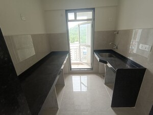 Kitchen in 1 BHK Apartment at JP North Elara, Mira Road – for Sale