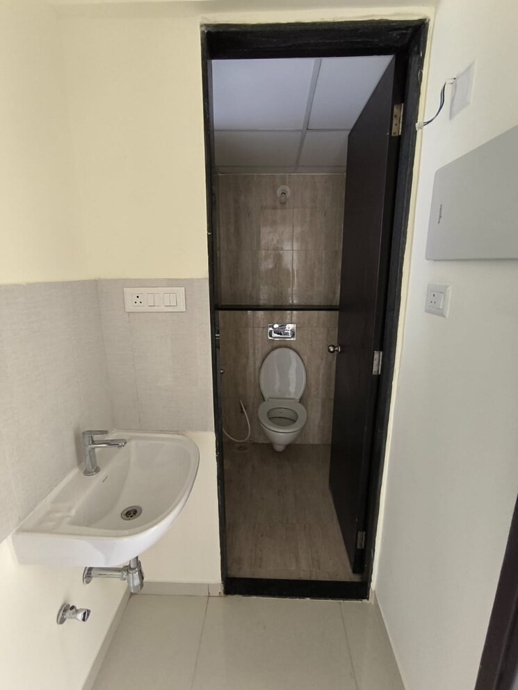 Bathroom, kolte-patil-life-republic-r-10 2 Bedroom 650 Sq.Ft. Apartment In Hinjewadi Pune 8507271