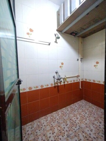 Bathroom in 1.5 BHK Apartment at Nimbeshwar Chs, Vichumbe – for Sale