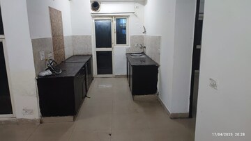Kitchen in 2 BHK Apartment at Aims Golf City, Sector 75 – for Rent