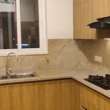 Kitchen in 2 BHK Apartment at Ambience Creacions, Sector 22 – for Rent