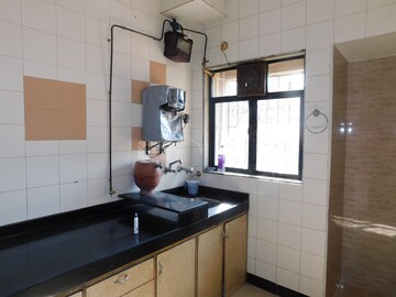 Kitchen in 2 BHK Apartment at Gala Pride Park, Manpada – for Rent