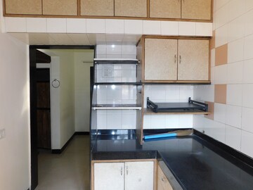 Kitchen in 2 BHK Apartment at Gala Pride Park, Manpada – for Rent