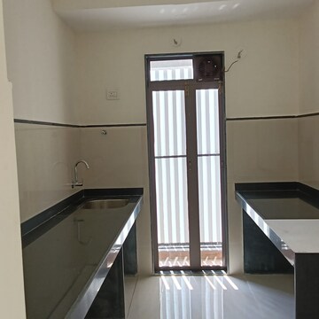 Kitchen in 1 BHK Apartment at Runwal My City Phase II Cluster 05, Dombivli East – for Rent