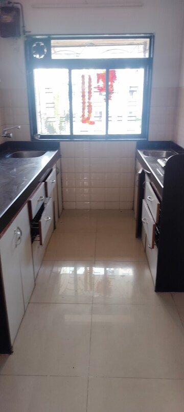 Kitchen in 2 BHK Apartment at Jeevan Sapna Apartment, Andheri West – for Rent