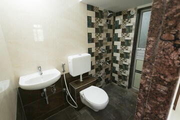 Bathroom in 1 BHK Apartment at Vedant Sumeet Elite, Balkum Pada – for Sale