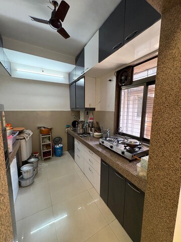 Kitchen in 1.5 BHK Apartment at Thane West – for Sale