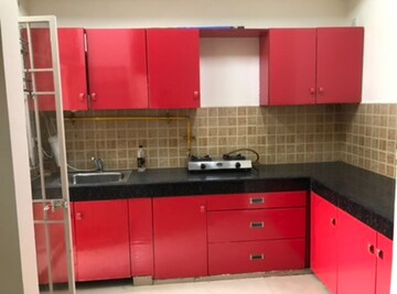 Kitchen in 2 BHK Apartment at Mahagun Mywoods, Sector 16c Greater Noida – for Rent