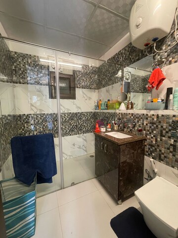 Bathroom in 3 BHK Builder Floor at Ansal Sushant Residency, Sushant Lok Iii – for Sale