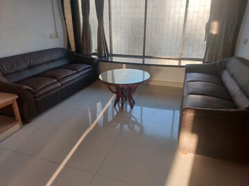 Living Room in 2 BHK Apartment at Rustomjee Elanza, Malad West – for Rent