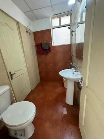 Attached Bathroom in 3 BHK Apartment at Sushma Elite Cross, Dhakoli Village – for Sale
