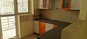 Kitchen in 4 BHK Apartment at Amrapali Zodiac, Sector 120 – for Sale