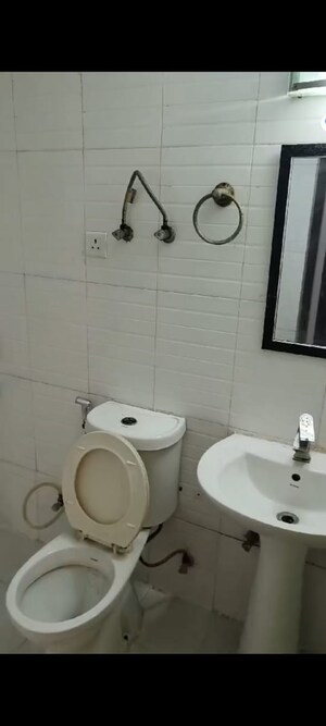 Bathroom in 3 BHK Apartment at Amrapali Zodiac, Sector 120 – for Sale